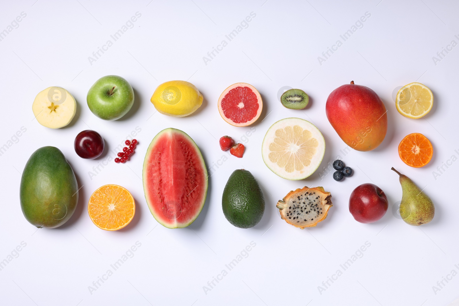 Photo of Different ripe fruits and berries on white background, top view