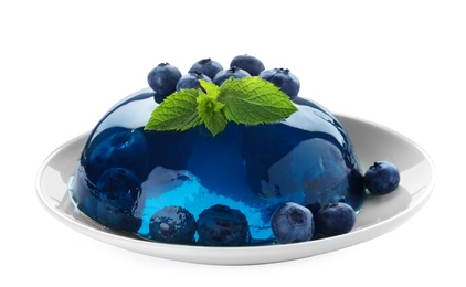 Photo of Delicious jelly with blueberries and mint on white background
