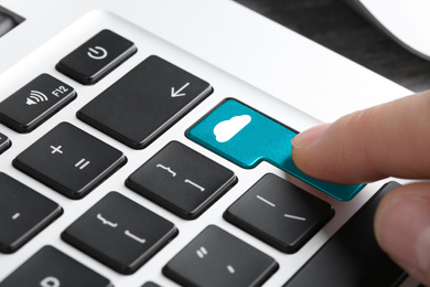 Image of Cloud technology. Woman pressing button on laptop keyboard, closeup