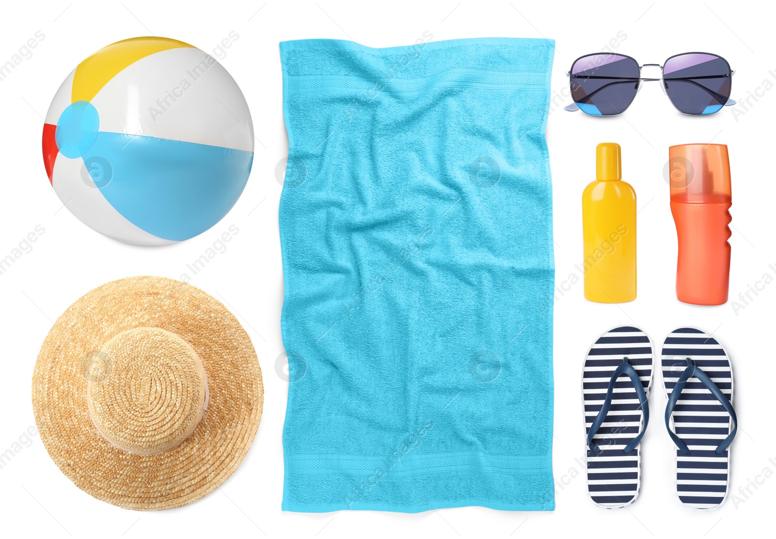 Image of Set with towel and other beach accessories on white background