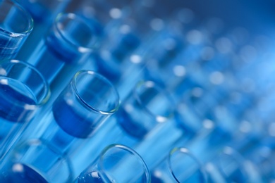 Test tubes with blue liquid, closeup. Laboratory analysis