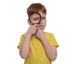Photo of Thoughtful boy looking through magnifier glass on white background