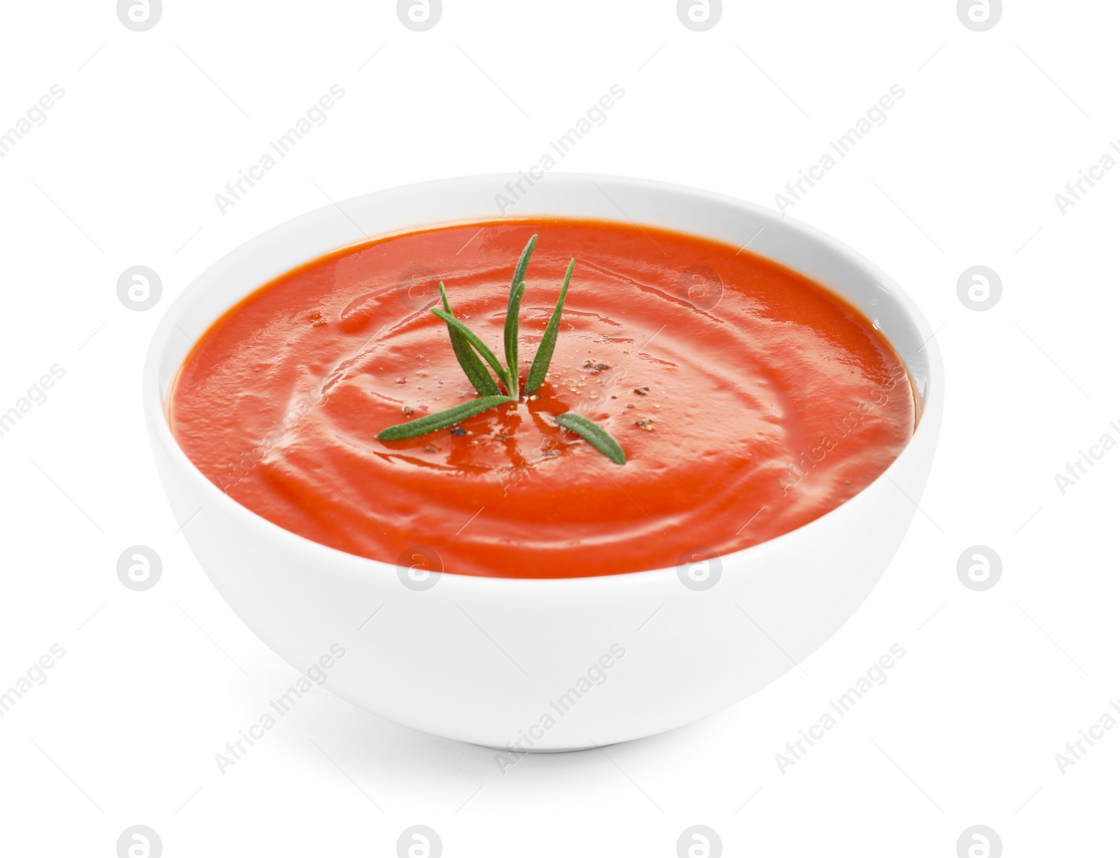 Photo of Bowl with fresh homemade tomato soup on white background