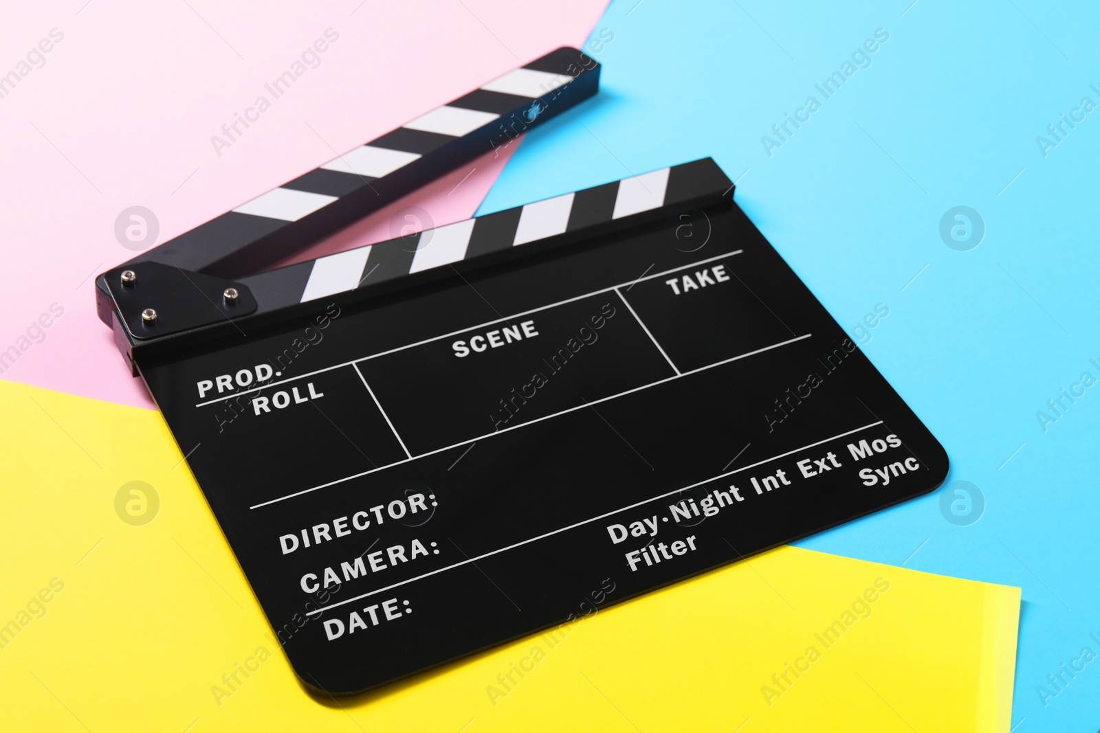 Photo of Clapperboard on color background, closeup. Film industry