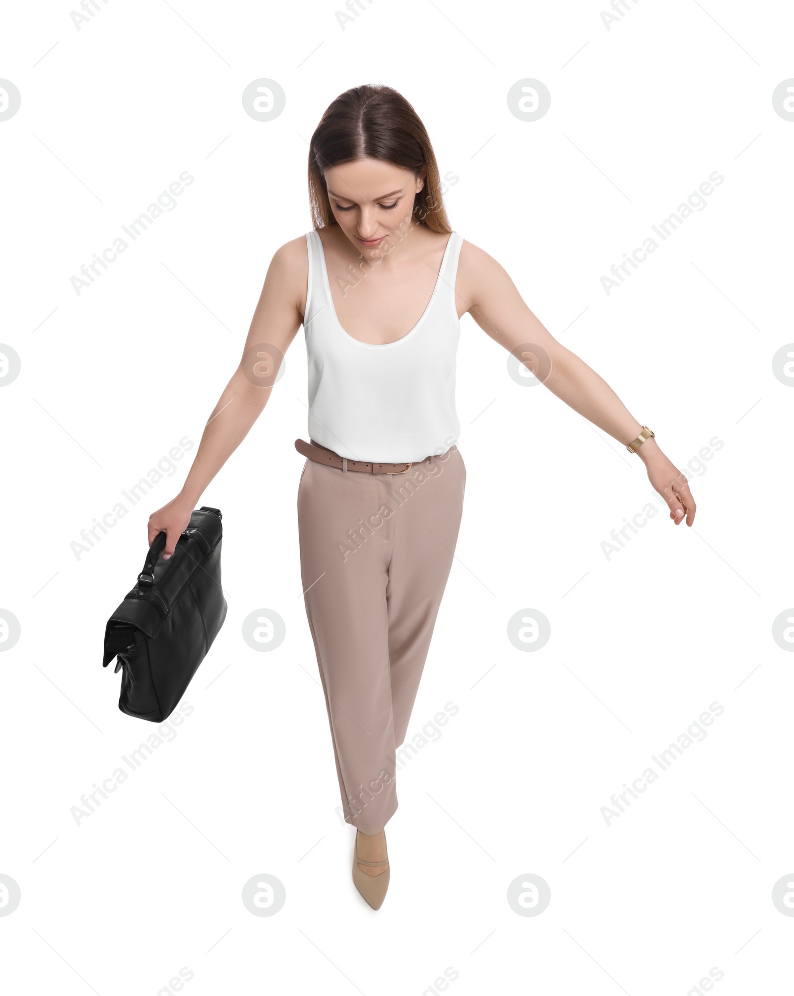 Photo of Beautiful businesswoman with briefcase walking on white background, above view