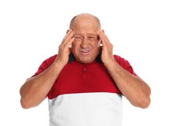 Mature man suffering from headache on white background