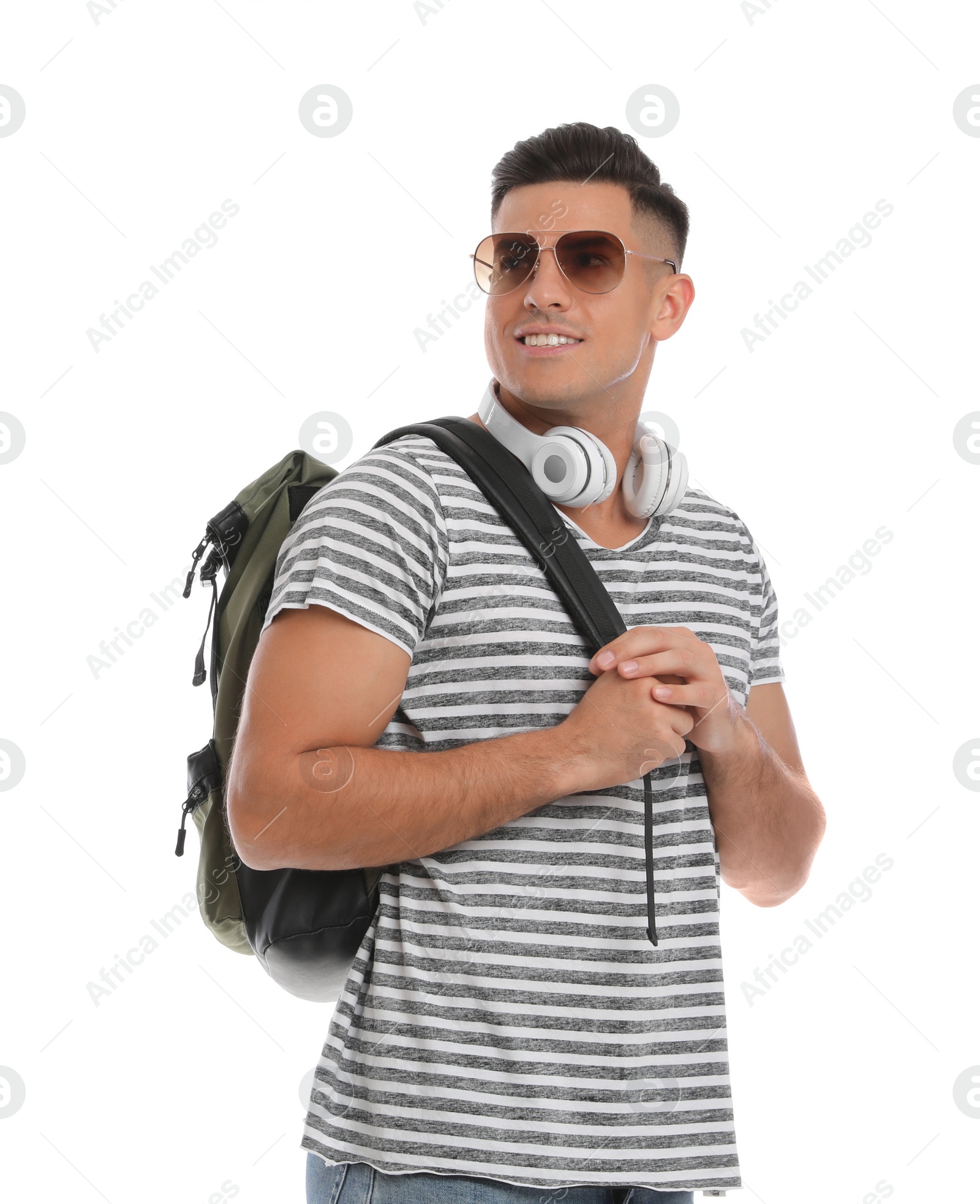 Photo of Man with backpack and headphones on white background. Summer travel
