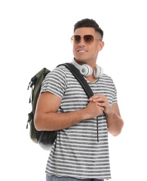 Man with backpack and headphones on white background. Summer travel