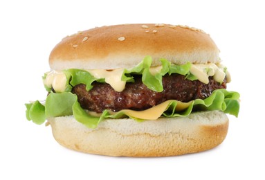 Photo of Delicious cheeseburger with lettuce, sauce and patty isolated on white