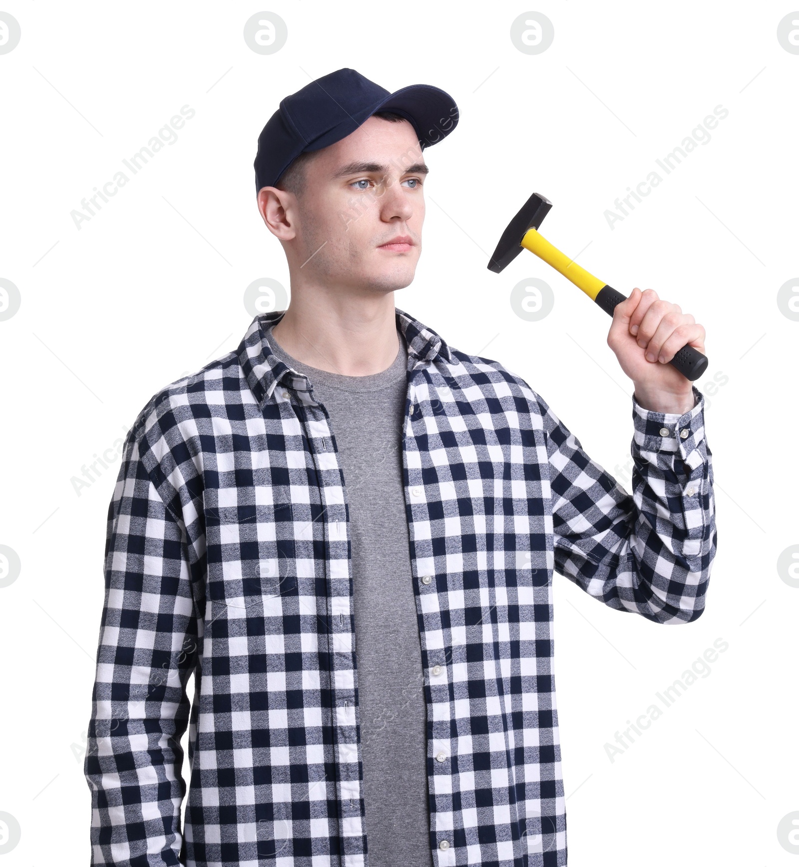 Photo of Young man holding hammer on white background