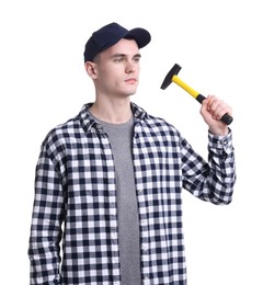 Photo of Young man holding hammer on white background