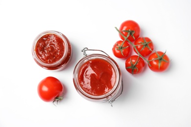 Photo of Composition with tasty homemade tomato sauce on white background, top view