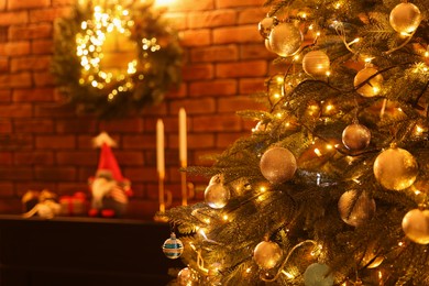 Beautiful Christmas tree with festive lights in living room, closeup. Interior design