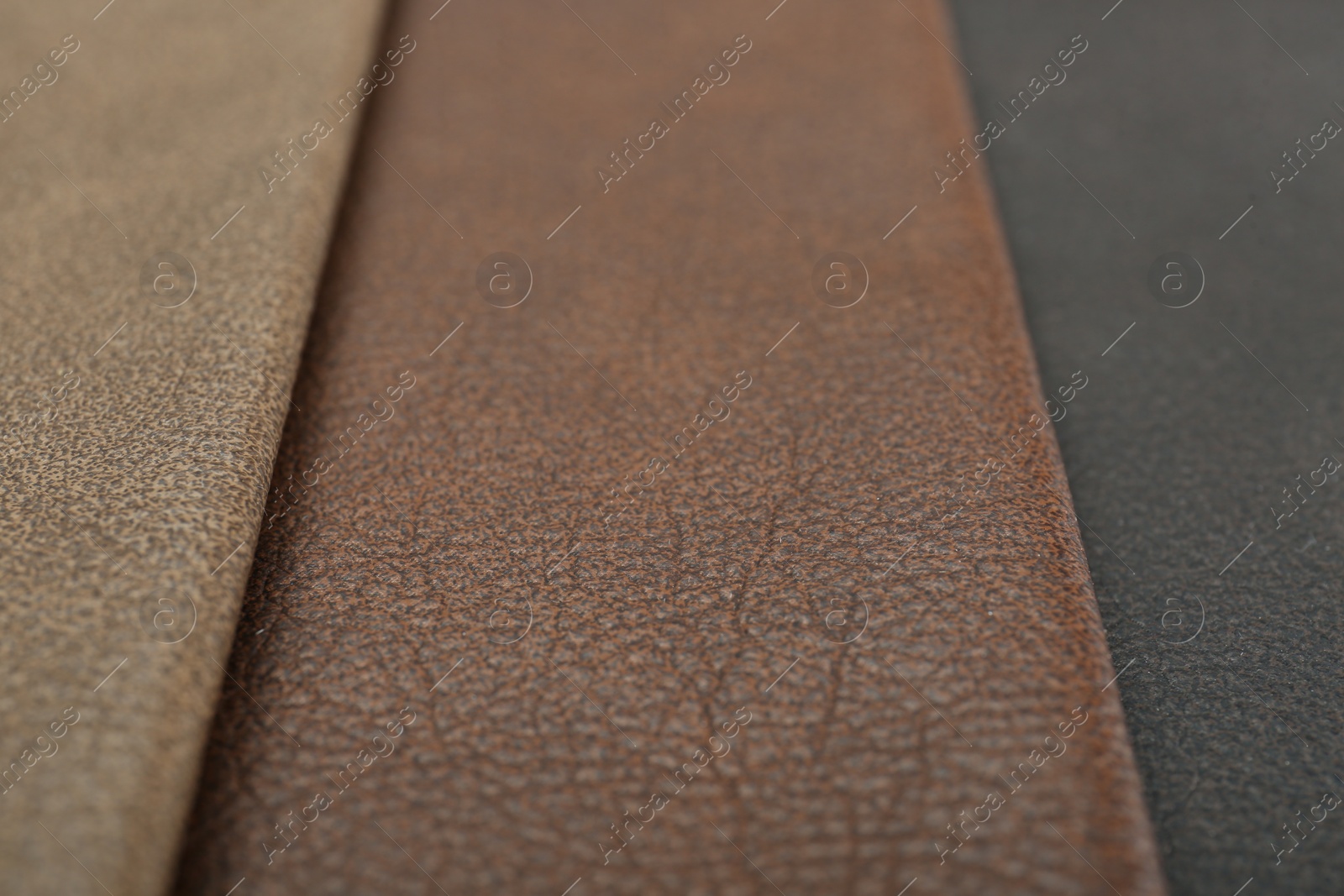 Photo of Different natural types of leather as background, closeup view