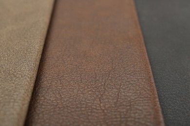 Photo of Different natural types of leather as background, closeup view