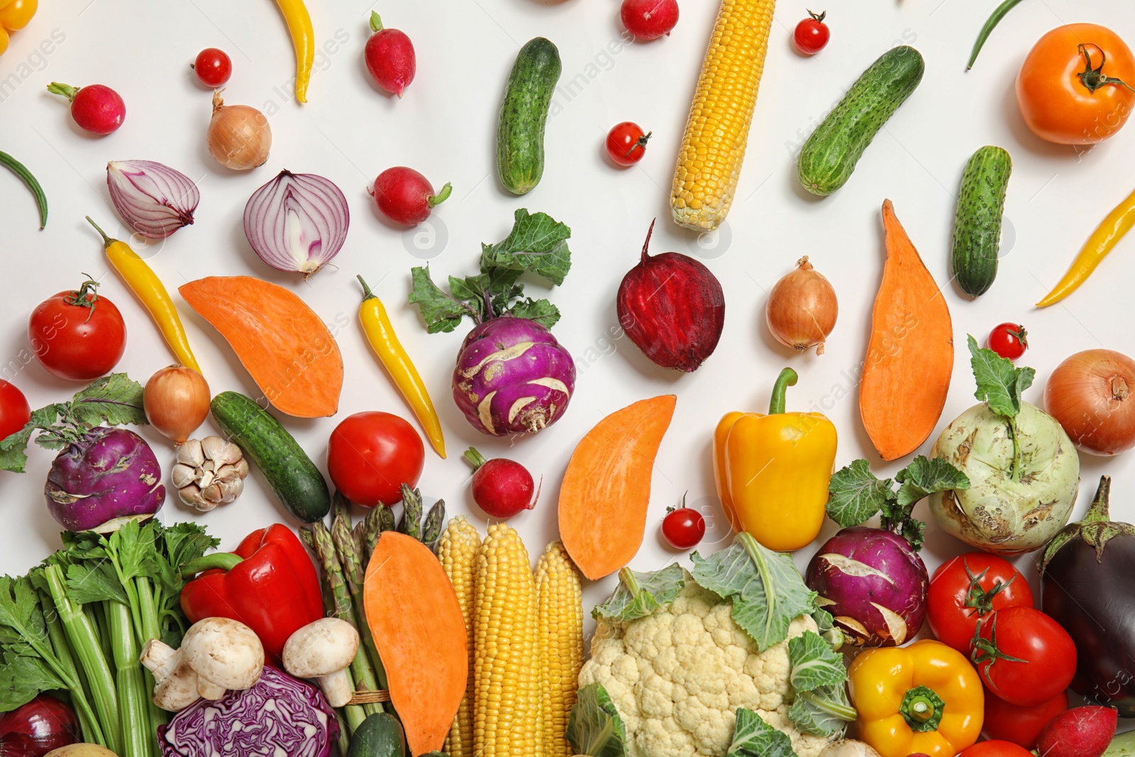 Photo of Flat lay composition with fresh vegetables on white background