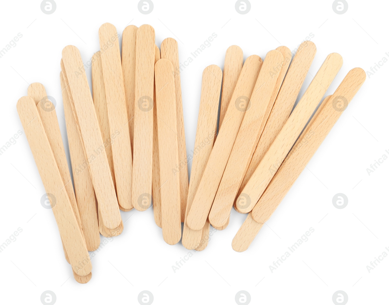 Photo of Disposable wooden spatulas for depilatory wax on white background, top view