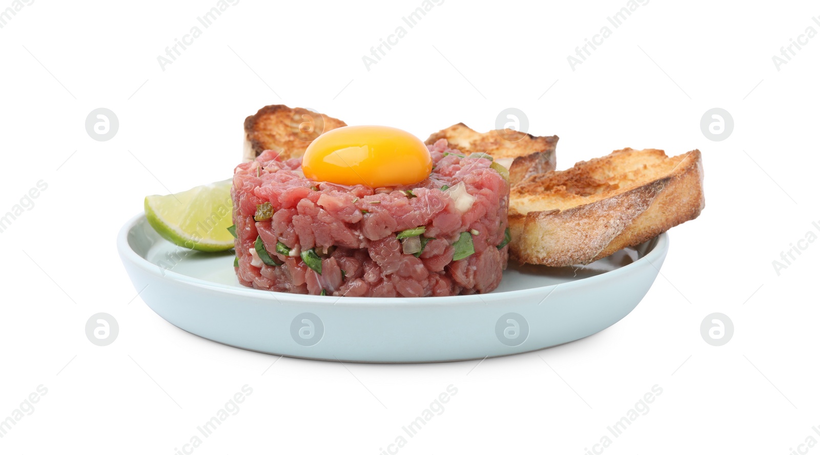 Photo of Tasty beef steak tartare served with yolk and toasted bread isolated on white