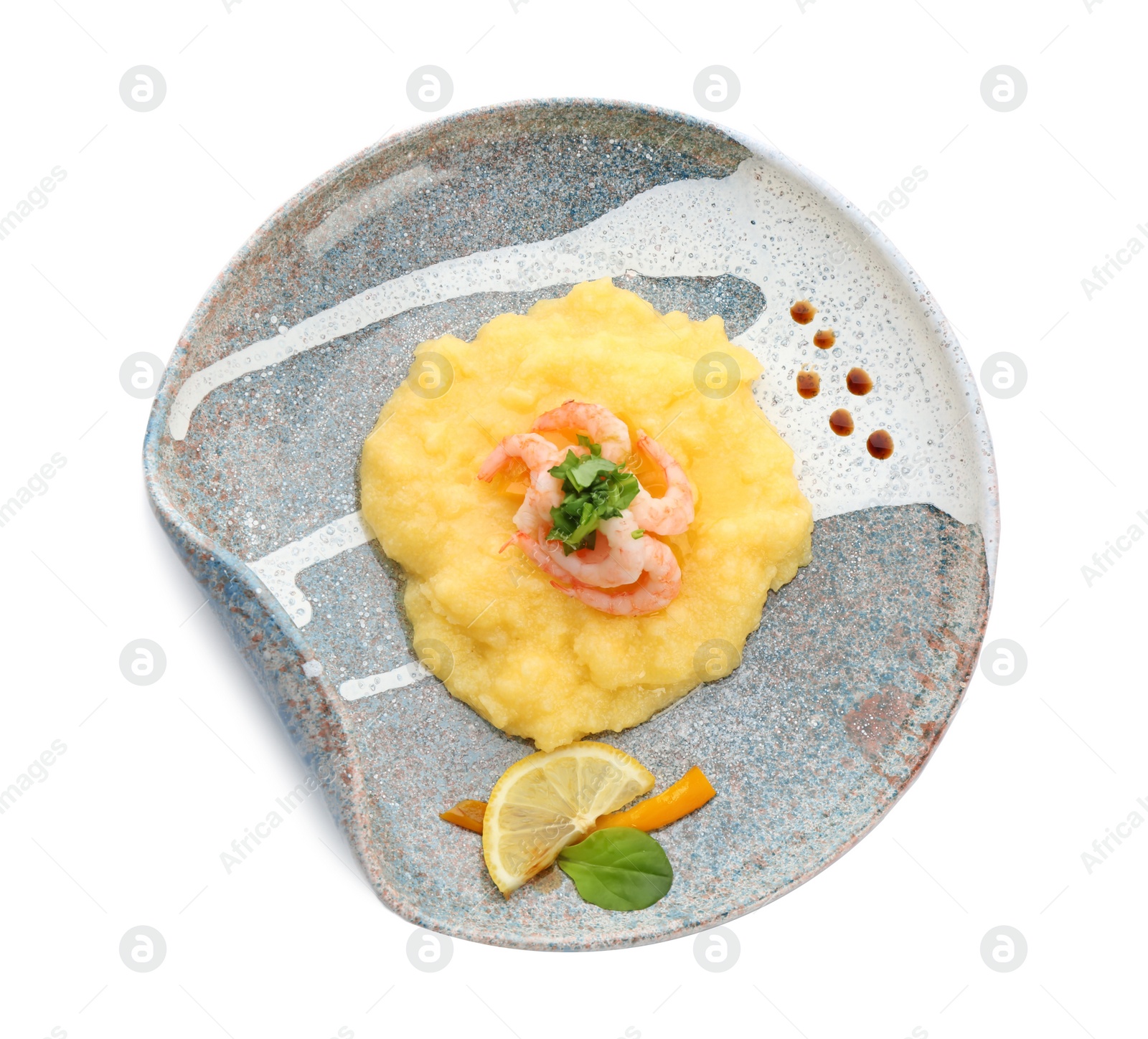 Photo of Plate with tasty shrimps and grits on white background, top view