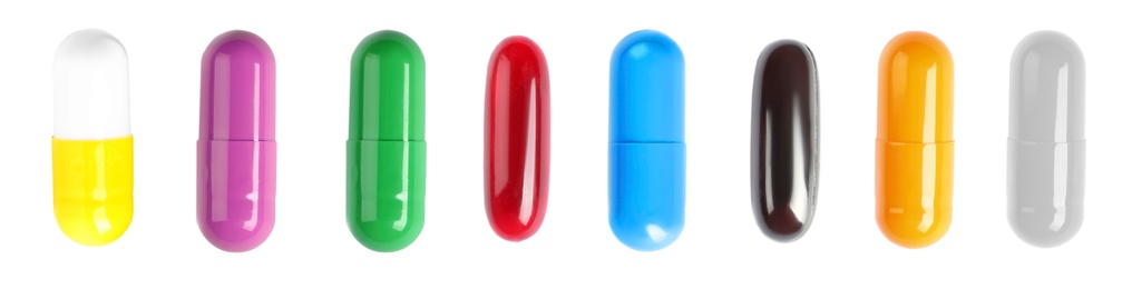 Image of Set with colorful pills on white background, top view. Banner design