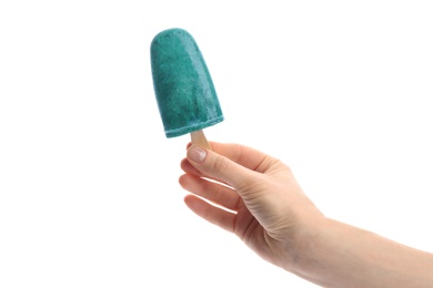 Photo of Woman holding spirulina popsicle on white background, closeup