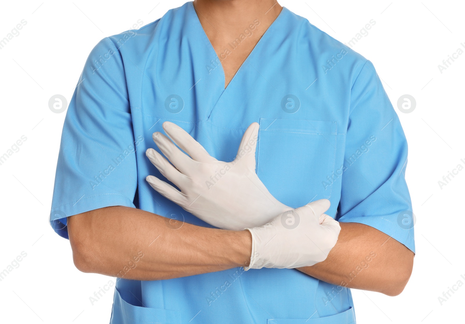 Photo of Male doctor putting on rubber gloves against white background. Medical object