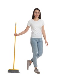 Photo of Beautiful young woman with broom on white background