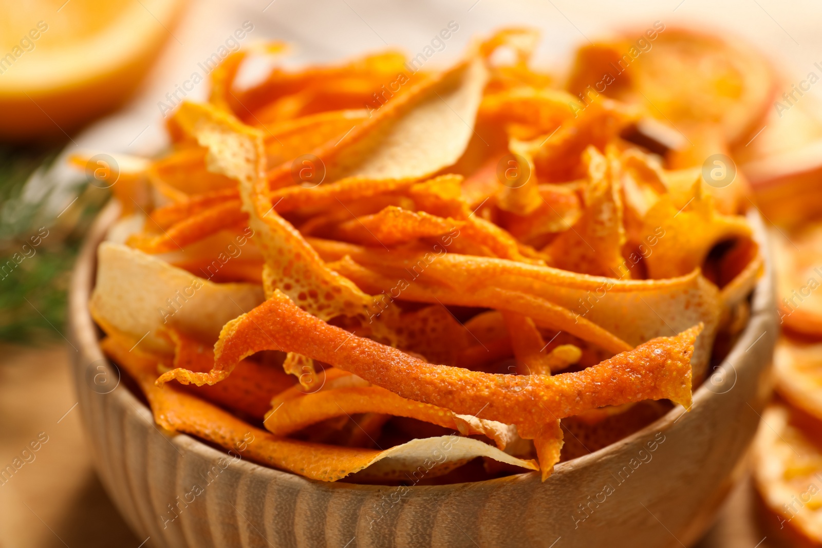 Photo of Dry orange peels on table, closeup view