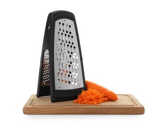 Photo of Stainless steel grater and fresh carrot on white background