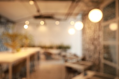 Blurred view of beautiful modern cafe interior