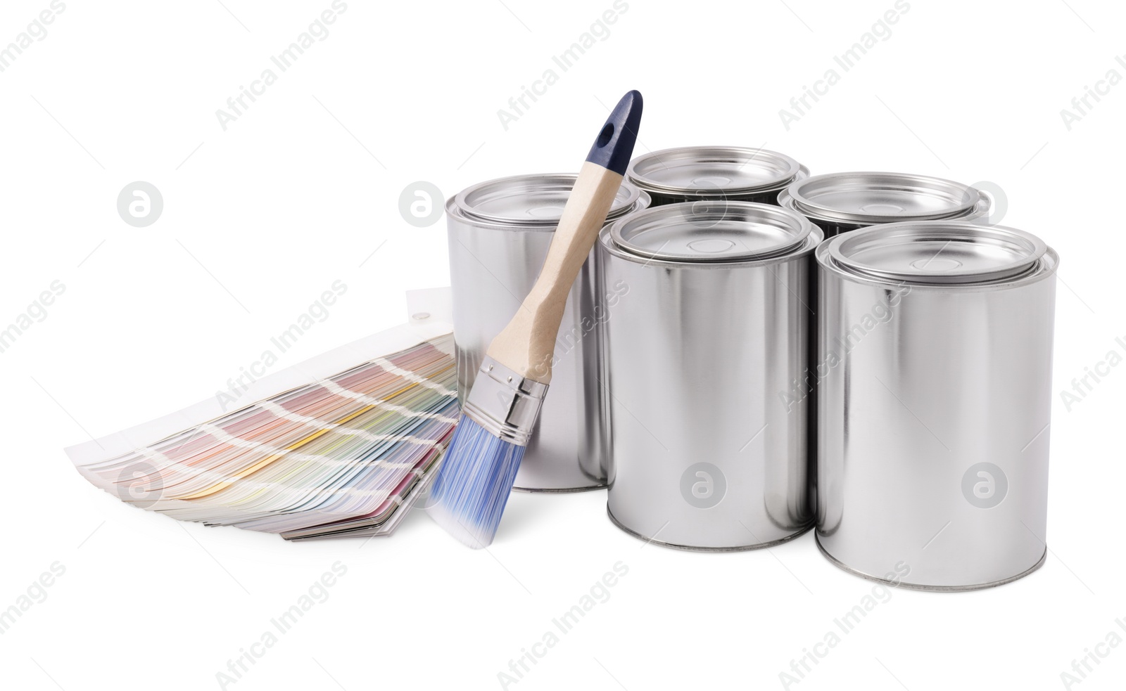 Photo of Cans of paints, brush and color palette on white background