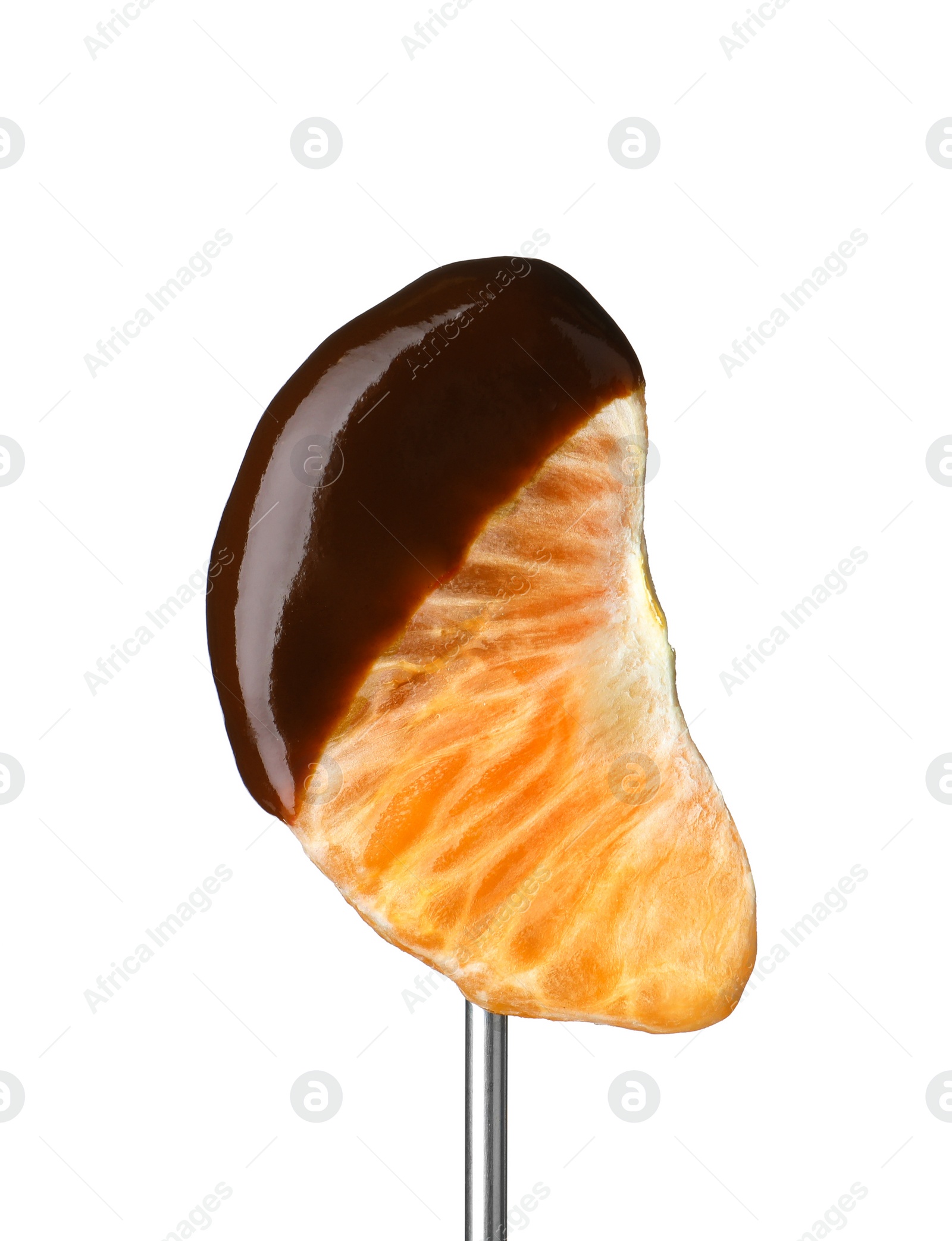 Photo of Segment of mandarin with chocolate on fondue fork against white background