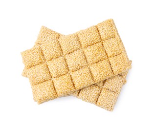 Photo of Delicious sesame kozinaki bars on white background, top view