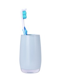 Photo of One plastic toothbrush in holder isolated on white