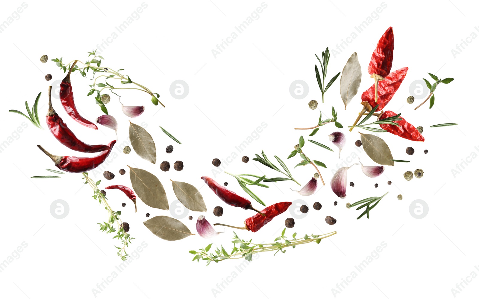 Image of Many different spices flying on white background