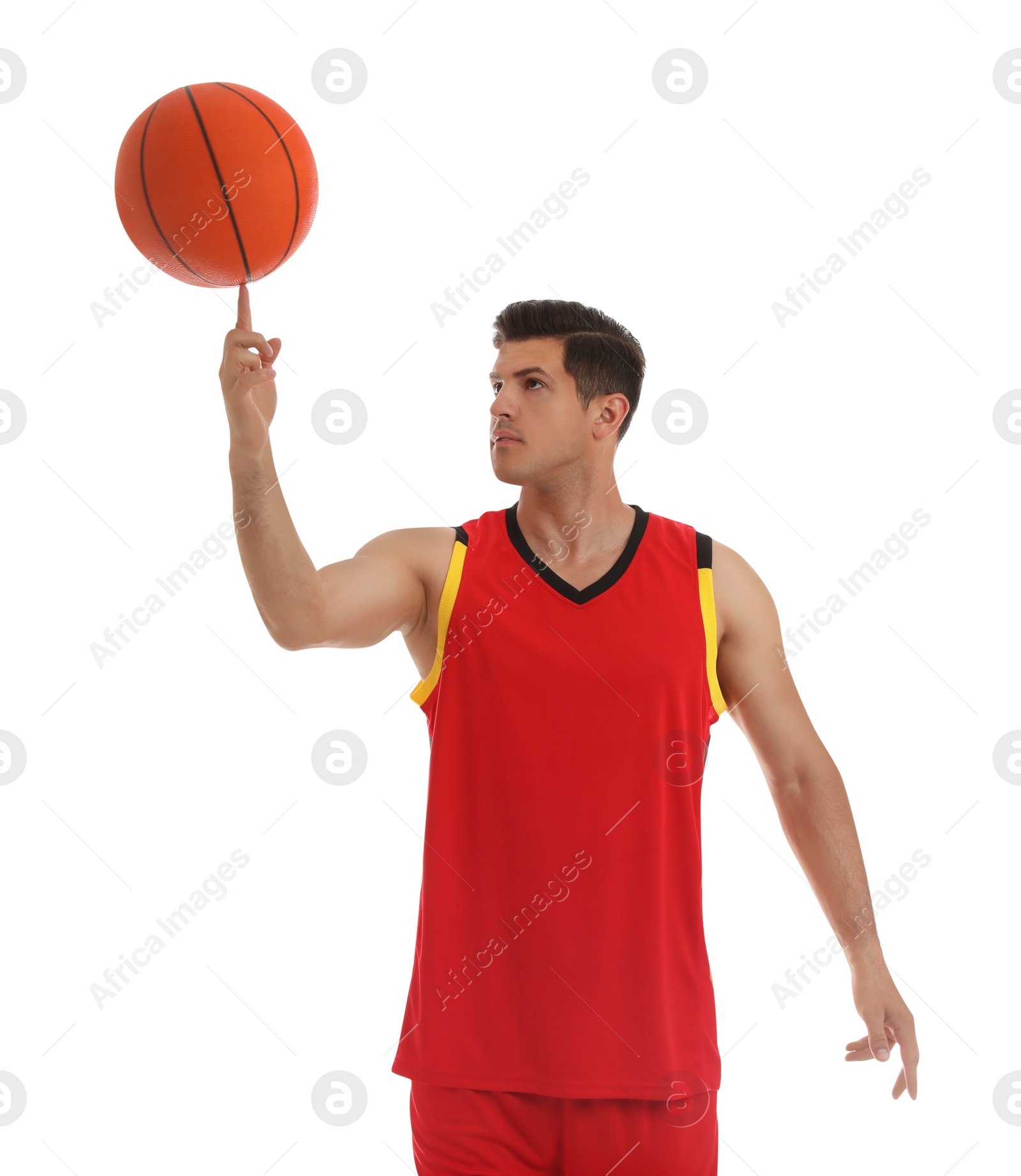 Photo of Basketball player spinning ball on finger against white background