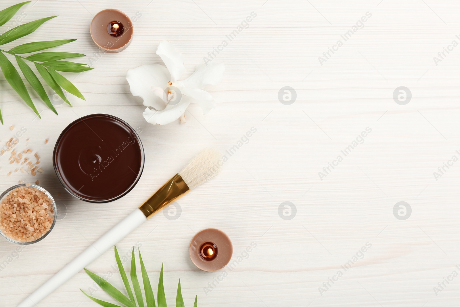 Photo of Flat lay composition with cosmetic product on white wooden background, space for text. Spa body wraps
