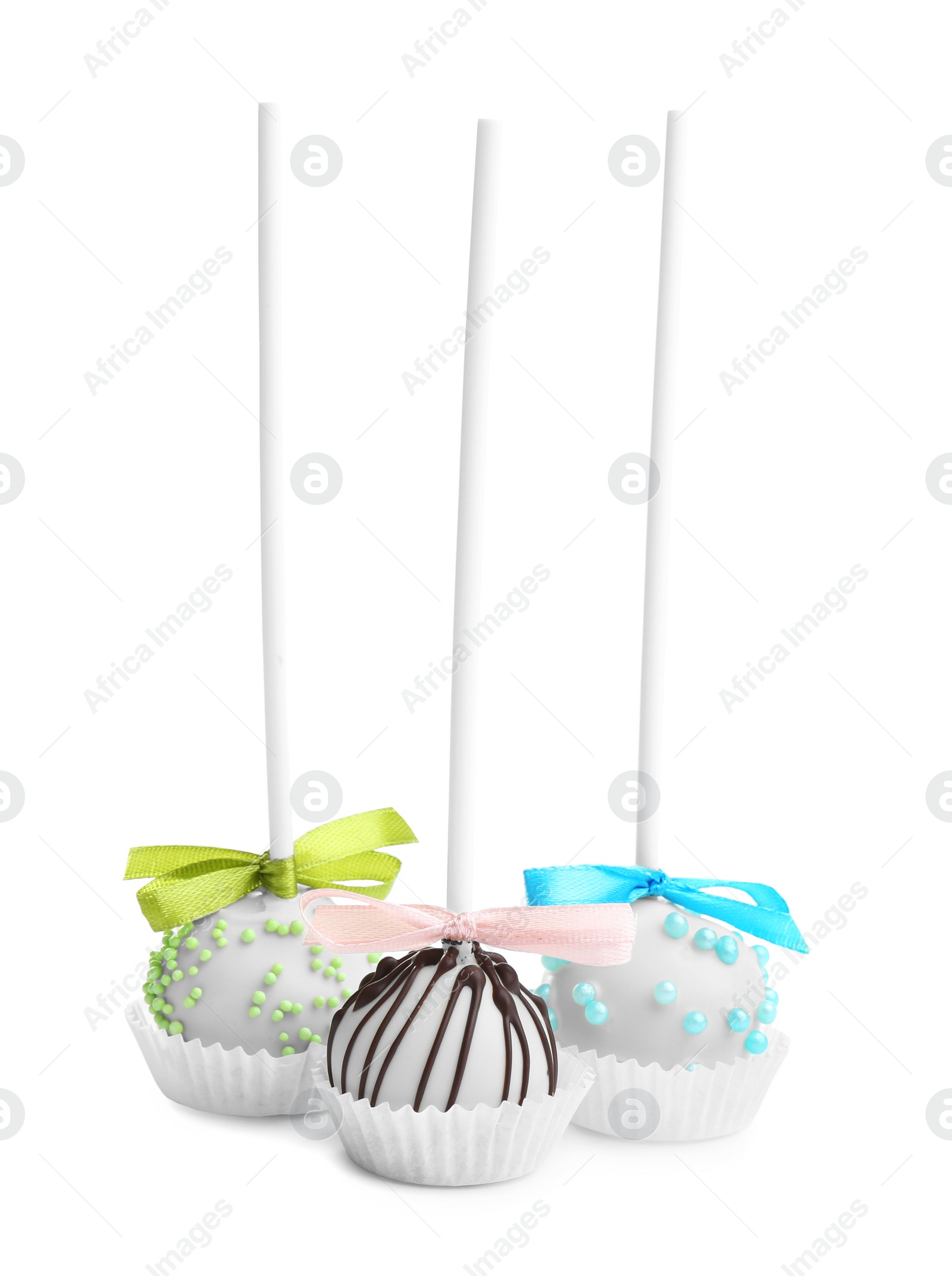 Image of Different tasty cake pops on white background