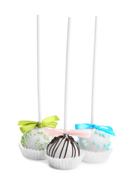 Image of Different tasty cake pops on white background