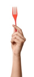 Photo of Woman holding plastic fork on white background, closeup