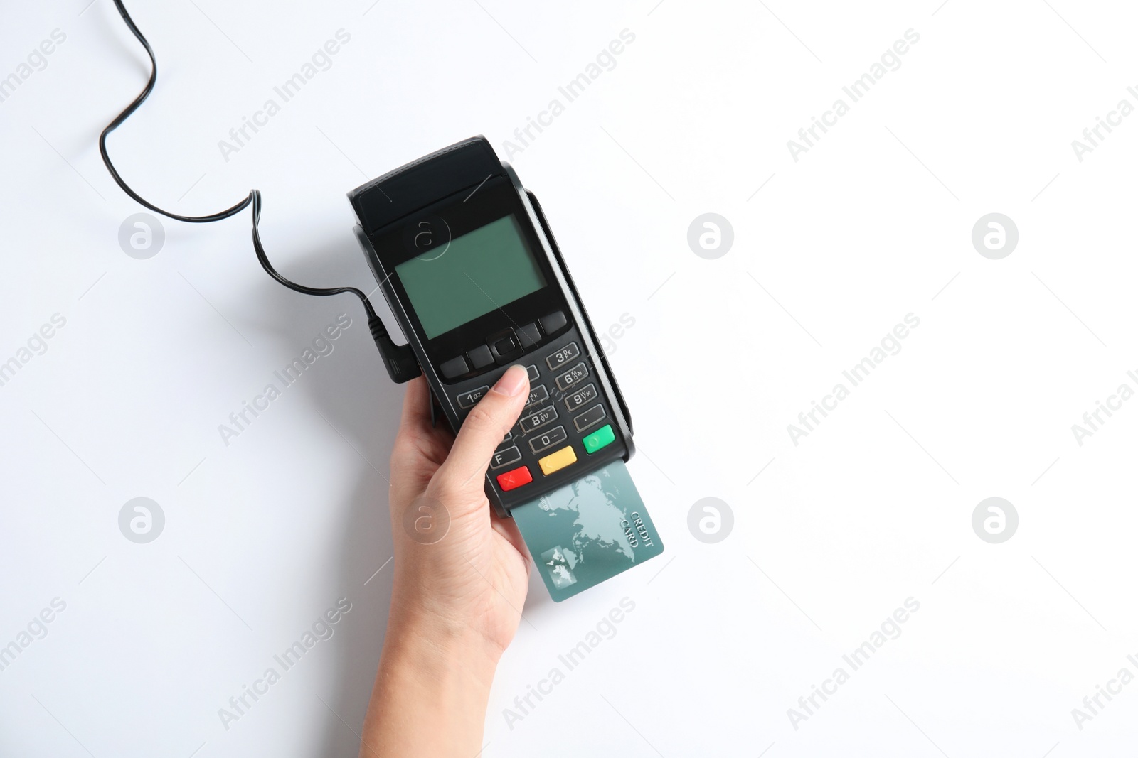 Photo of Woman using modern payment terminal on white background, top view. Space for text