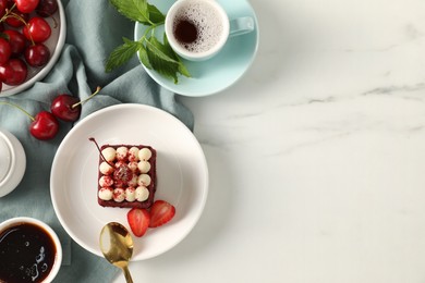 Photo of Piece of delicious red velvet cake with fresh berries served on white marble table, flat lay. Space for text