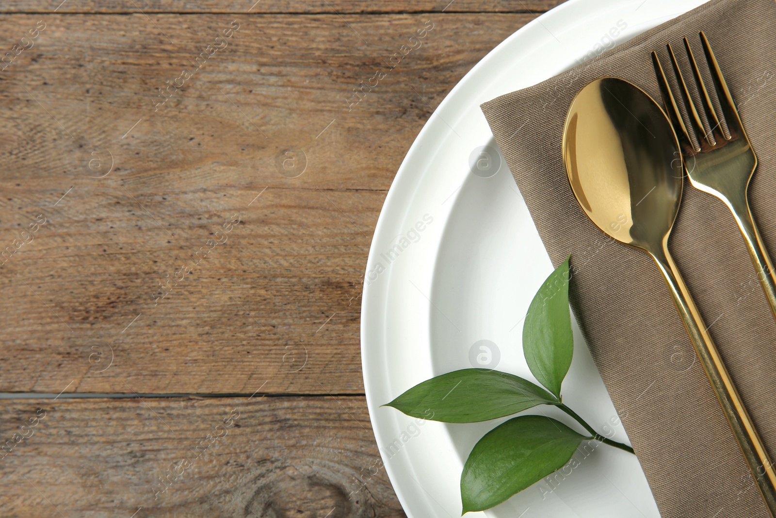 Photo of Beautiful table setting on wooden background, flat lay. Space for text