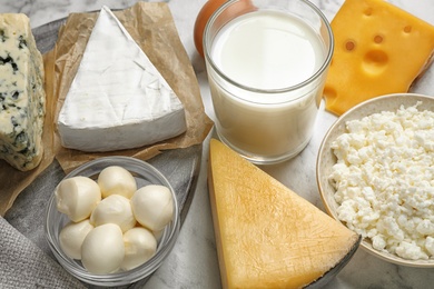 Photo of Different delicious dairy products on table, closeup