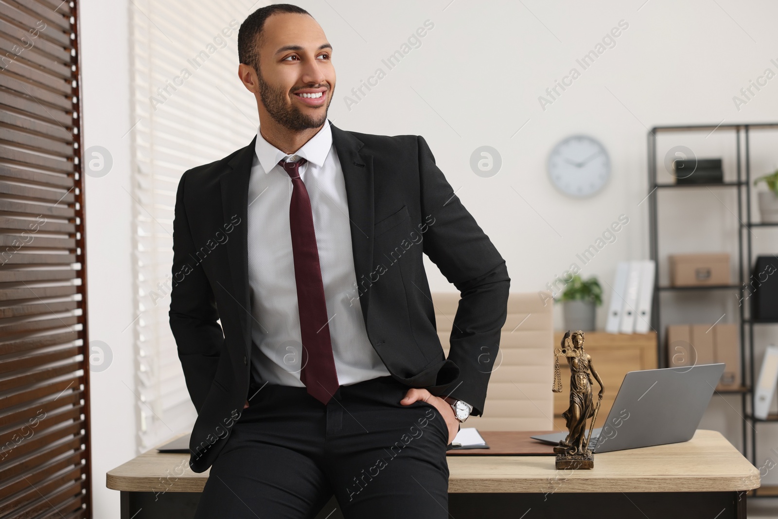 Photo of Portrait of smiling lawyer in office, space for text
