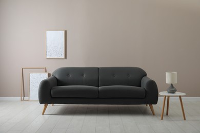Living room interior with stylish comfortable sofa