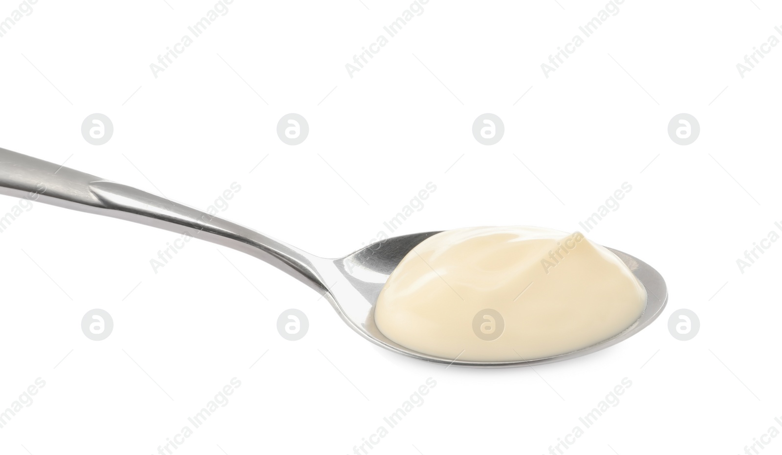 Photo of Metal spoon with mayonnaise isolated on white