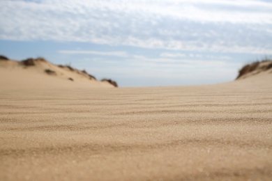 Photo of Dry sand in desert on sunny day