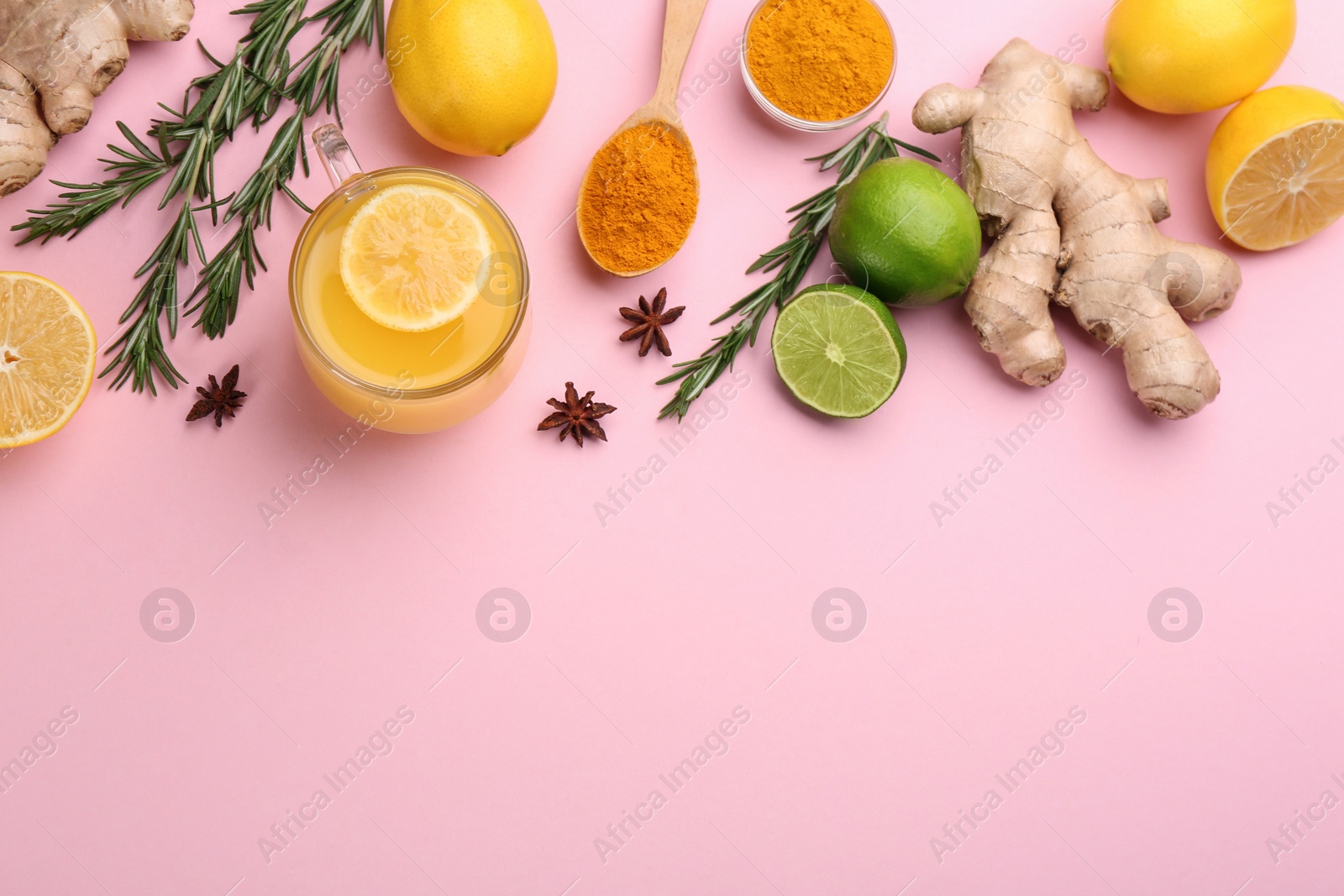 Photo of Flat lay composition with immunity boosting drink on pink background. Space for text