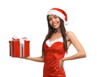 Beautiful Asian woman in Santa costume with Christmas gift on white background